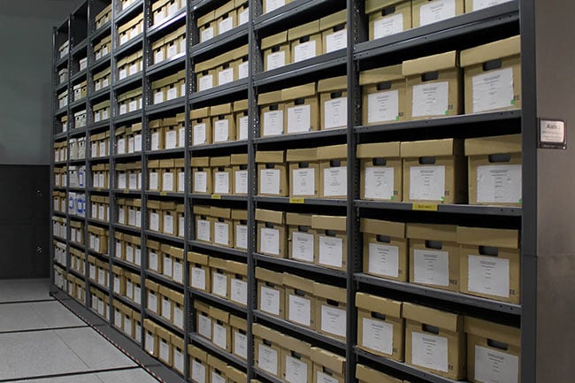 Boxed Files Stored on Compact Shelving