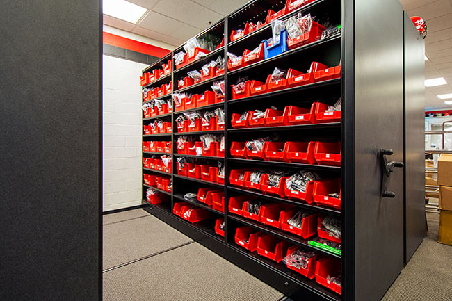 Athletic Equipment Maintenance Supplies Stored on Mobile Shelving