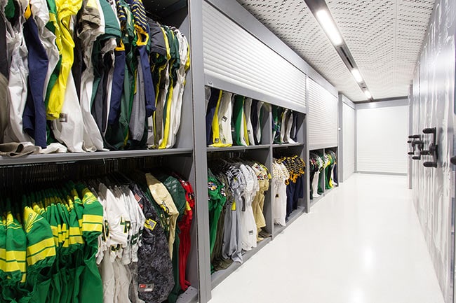 Football Jerseys Stored in 4-Post Shelving with Lockable Doors