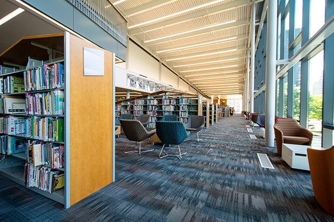 Library Shelving with Creative End Panels and Tops