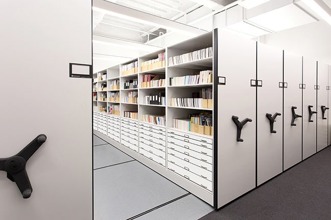 Mechanical-Assist Mobile Shelving Storing Library Equipment and Supplies