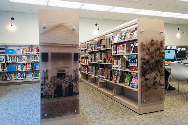 Public Library Cantilever Shelving with Custom End Panel Graphics