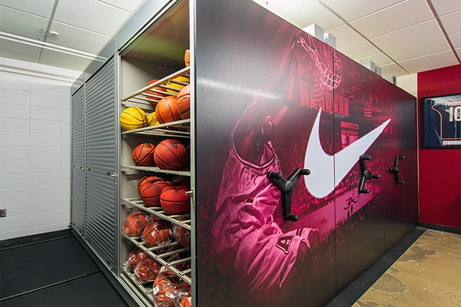 Basketball Equipment Stored in Moveable Shelving