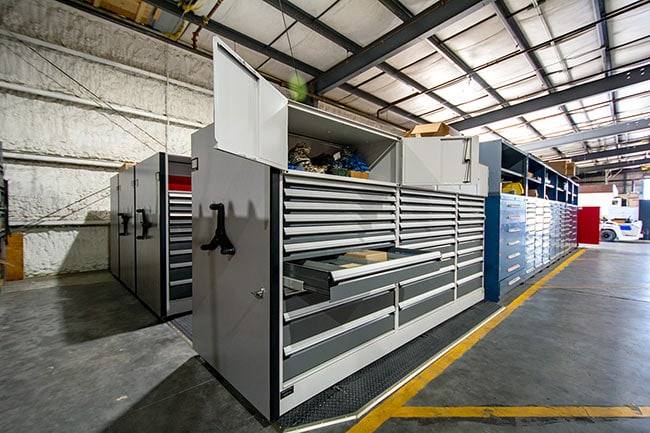 Military Base Maintenance Supply Storage on Mechanical-Assist Mobile Shelving