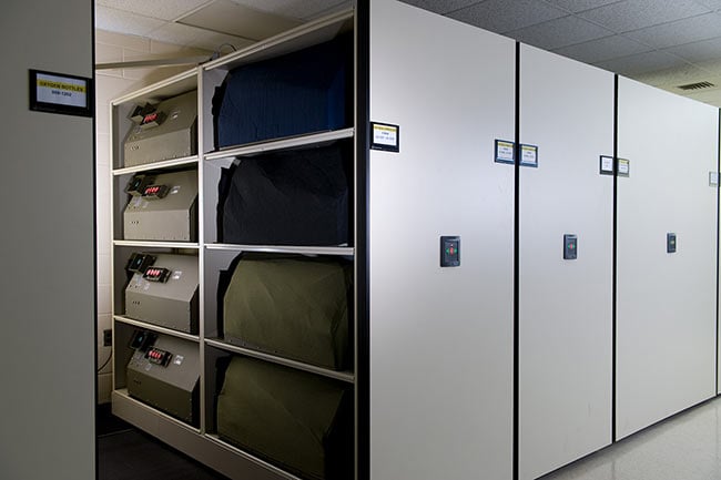 Mobile Shelving Storing Oxygen Consoles and Containers