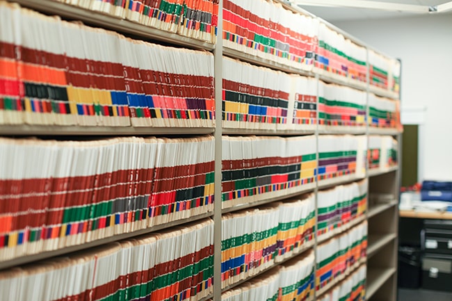 Police Case Files and Shelving Stored on 4-Post Shelving