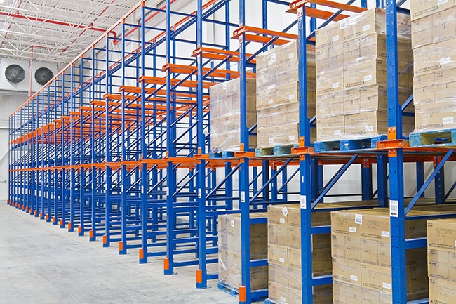 Boxed Files Stored on Compact Shelving